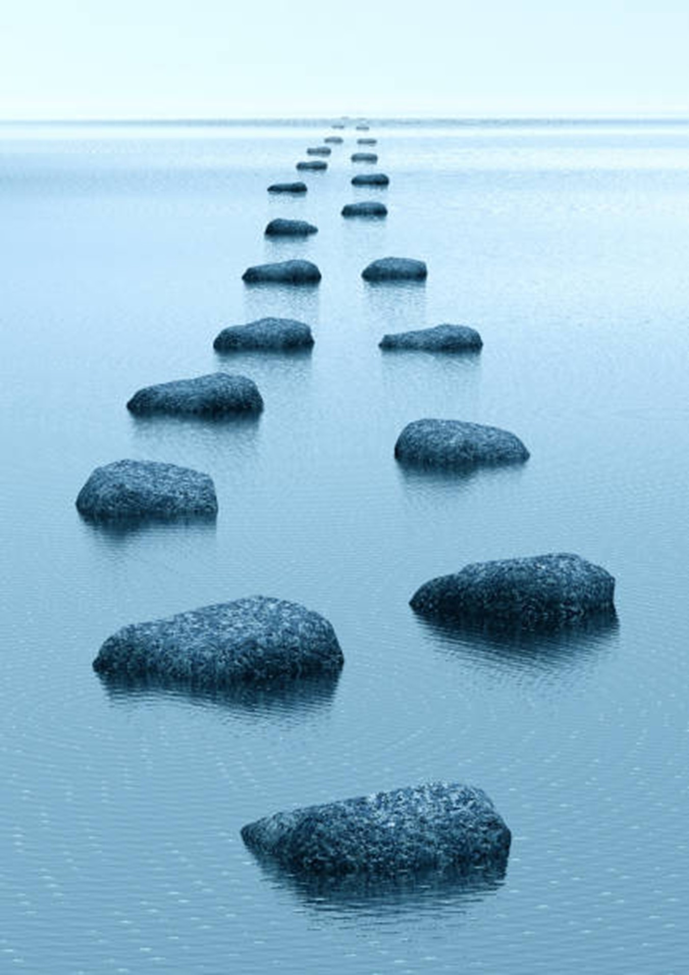Early and harmonious morning with fog over the lake in northern Sweden